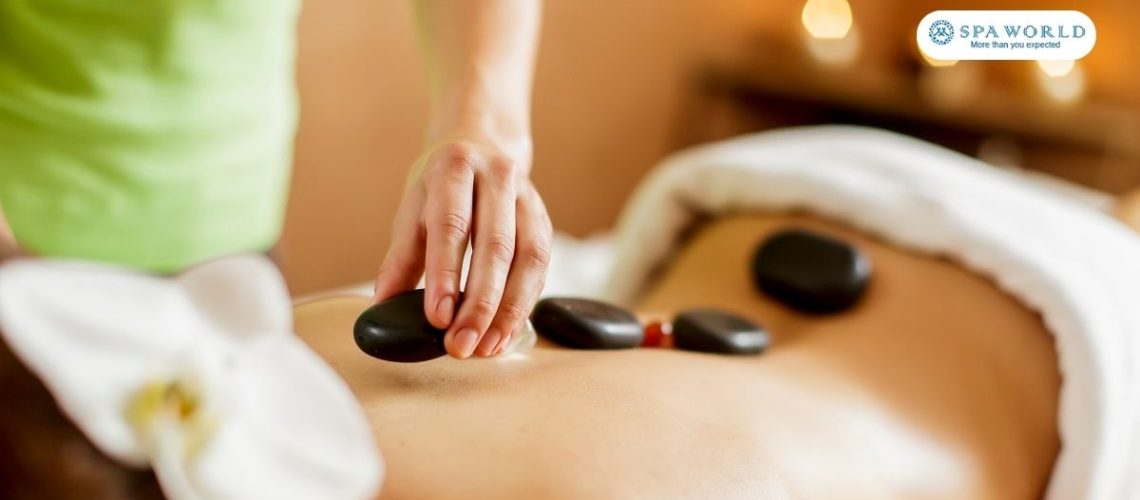 girl getting a hot stone massage